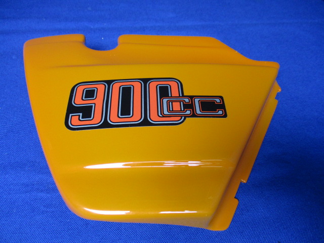 Batterieabdeckung links 90S daytona orange